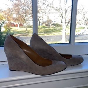 Tan suede coach pumps